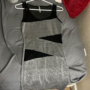 Black and glittery mini dress